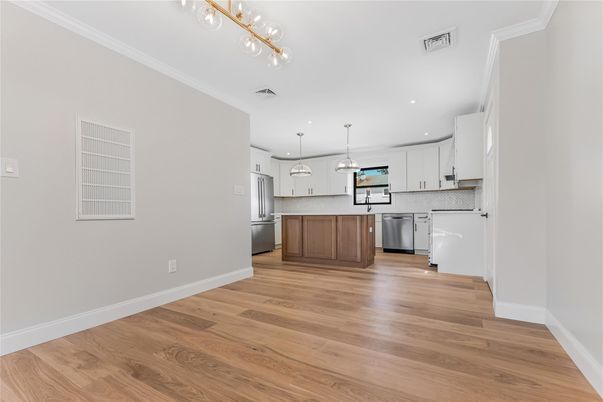 Interior, Kitchen, Pendant Lights, Recessed Lighting, Stainless Steel Appliances, Wood Texture Flooring