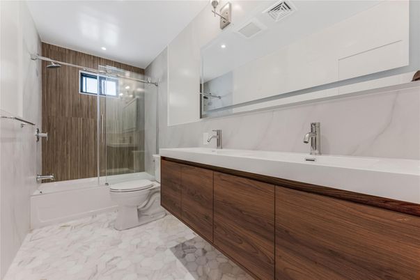 Bathroom, Dual Sink Vanities, Glass Shower, Interior, Marble, Recessed Lighting