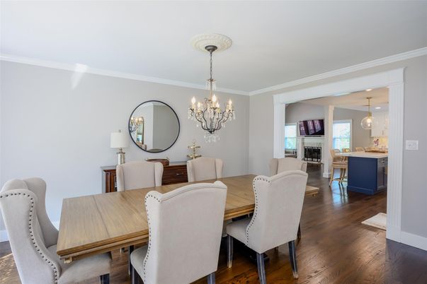 Chandelier, Dining room, Fireplace, Interior, Pendant Lights, Wood Texture Flooring