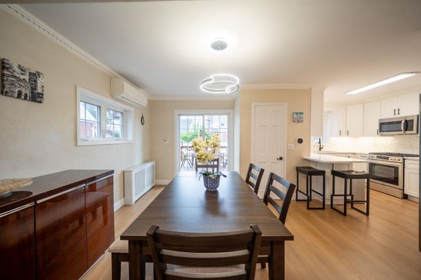 Dining room, Interior, Kitchen, Pendant Lights, Stainless Steel Appliances, Wood Texture Flooring