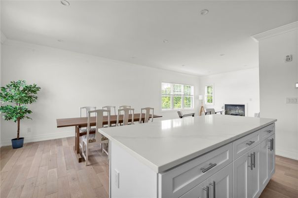 Dining room, Fireplace, Interior, Kitchen, Recessed Lighting, Wood Texture Flooring