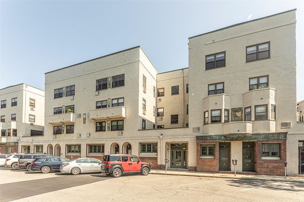 Exterior, Facade, Brick Facade, Condo Building