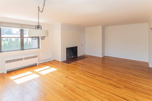 Empty room, Fireplace, Interior, Pendant Lights, Wood Texture Flooring