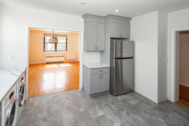 Interior, Kitchen, Pendant Lights, Recessed Lighting, Washer, Wood Texture Flooring