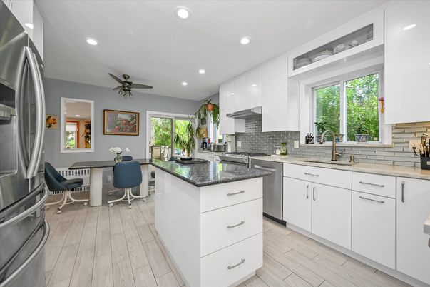Dining room, Interior, Kitchen, Recessed Lighting, Stainless Steel Appliances, Wood Texture Flooring