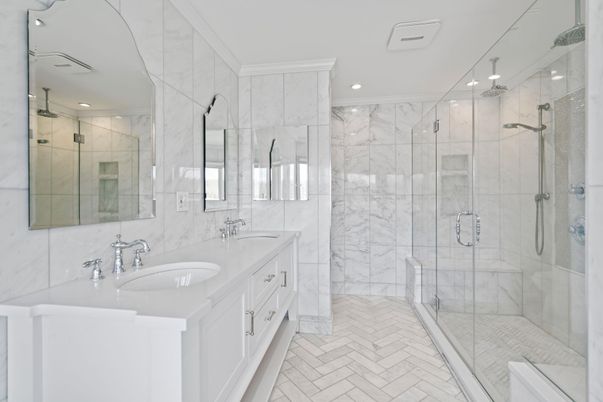 Bathroom, Dual Sink Vanities, Glass Shower, Interior, Marble Walls, Recessed Lighting