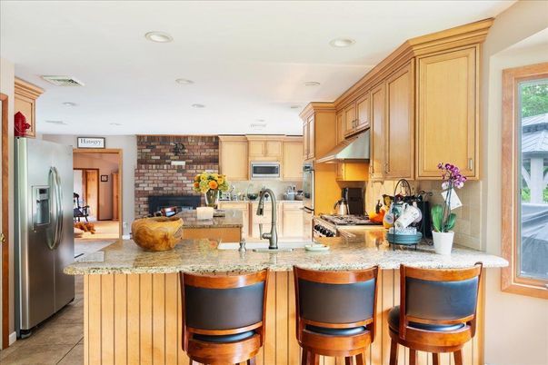 Fireplace, Interior, Kitchen, Recessed Lighting, Stone Walls