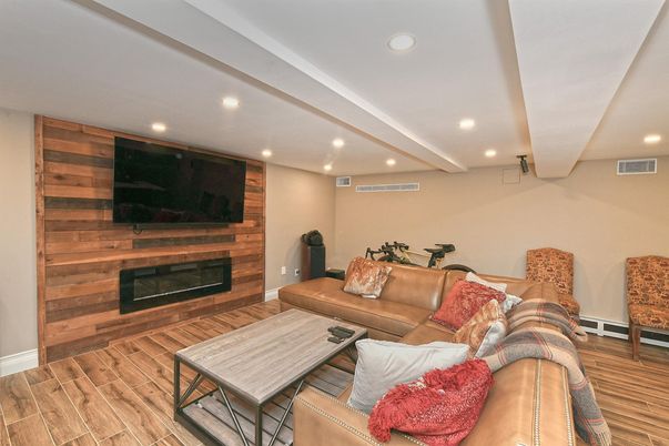 Fireplace, Interior, Living room, Recessed Lighting, Wood Texture Flooring, Wooden Walls