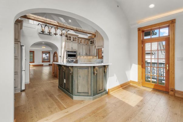 Chandelier, Interior, Kitchen, Recessed Lighting, Stainless Steel Appliances, Wood Texture Flooring