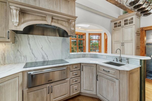 Interior, Kitchen, Marble Walls, Recessed Lighting, Stainless Steel Appliances, Wood Texture Flooring