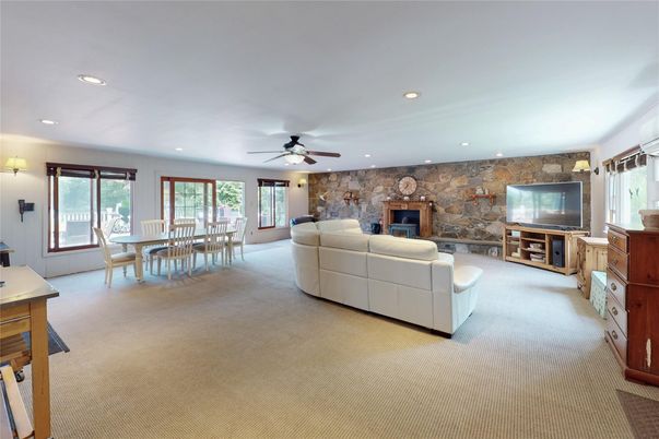 Dining room, Fireplace, Interior, Living room, Recessed Lighting, Stone Walls