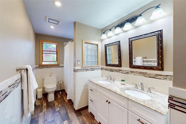 Bathroom, Dual Sink Vanities, Interior, Recessed Lighting, Wood Texture Flooring