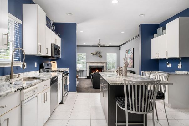 Fireplace, Interior, Kitchen, Living room, Recessed Lighting, Stainless Steel Appliances