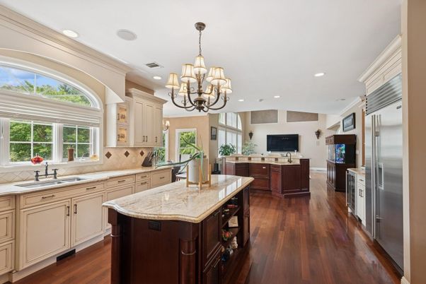 Chandelier, Interior, Kitchen, Recessed Lighting, Stainless Steel Appliances, Wood Texture Flooring