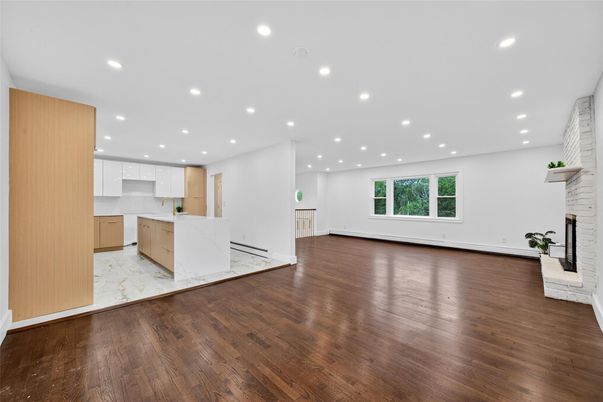 Empty room, Fireplace, Interior, Kitchen, Recessed Lighting, Wood Texture Flooring