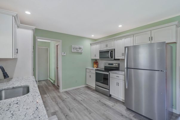 Interior, Kitchen, Recessed Lighting, Stainless Steel Appliances, Wood Texture Flooring