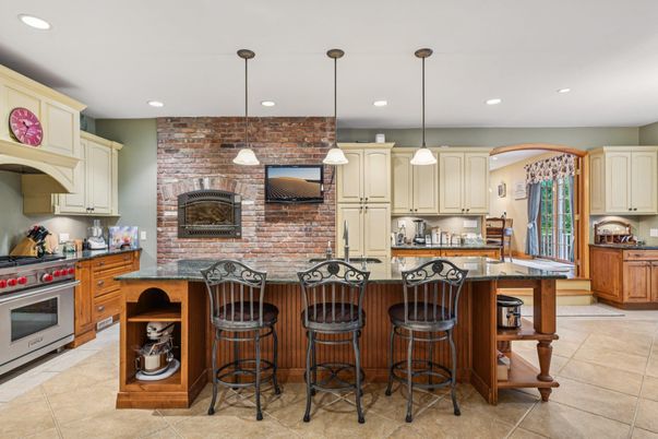 Interior, Kitchen, Pendant Lights, Recessed Lighting, Stainless Steel Appliances, Stone Walls