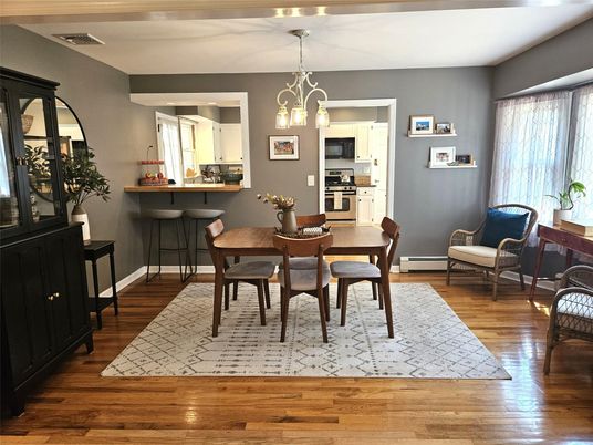 Dining room, Interior, Kitchen, Pendant Lights, Stainless Steel Appliances, Wood Texture Flooring