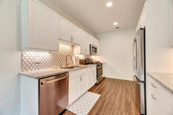 Interior, Kitchen, Recessed Lighting, Stainless Steel Appliances, Wood Texture Flooring
