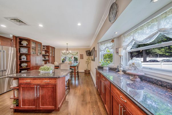 Chandelier, Dining room, Interior, Kitchen, Recessed Lighting, Stainless Steel Appliances, Wood Texture Flooring