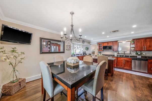 Chandelier, Dining room, Interior, Kitchen, Recessed Lighting, Stainless Steel Appliances, Wood Texture Flooring
