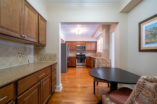 Dining room, Interior, Kitchen, Recessed Lighting, Stainless Steel Appliances, Wood Texture Flooring