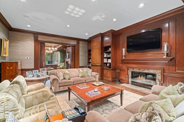 Chandelier, Dining room, Fireplace, Interior, Living room, Recessed Lighting, Wood Texture Flooring, Wooden Walls