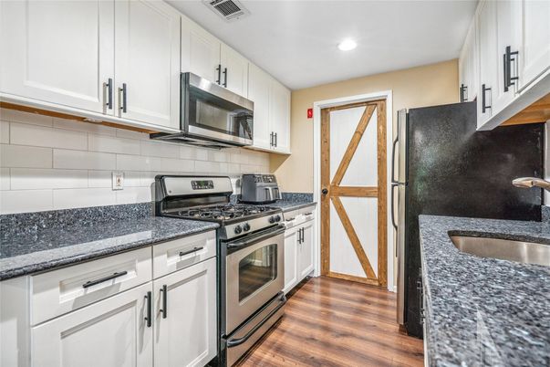 Interior, Kitchen, Recessed Lighting, Stainless Steel Appliances, Wood Texture Flooring