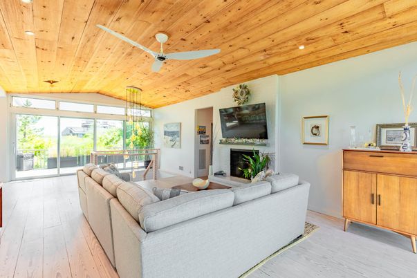 Dining room, Fireplace, Interior, Living room, Pendant Lights, Recessed Lighting, Wooden Ceilings, Wood Texture Flooring
