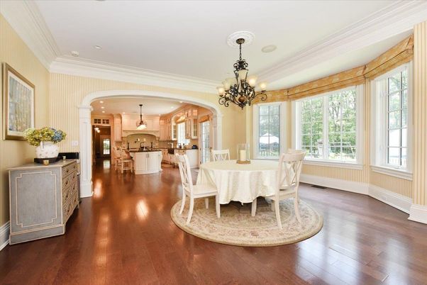 Chandelier, Dining room, Interior, Kitchen, Pendant Lights, Recessed Lighting, Stainless Steel Appliances, Wood Texture Flooring