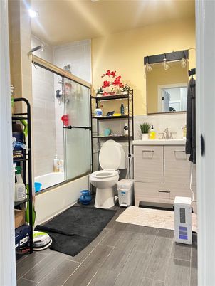 Bathroom, Glass Shower, Interior, Recessed Lighting, Wood Texture Flooring
