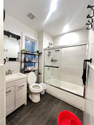Bathroom, Glass Shower, Interior, Recessed Lighting, Wood Texture Flooring