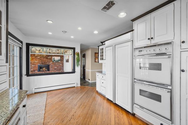 Fireplace, Interior, Kitchen, Recessed Lighting, Wood Texture Flooring