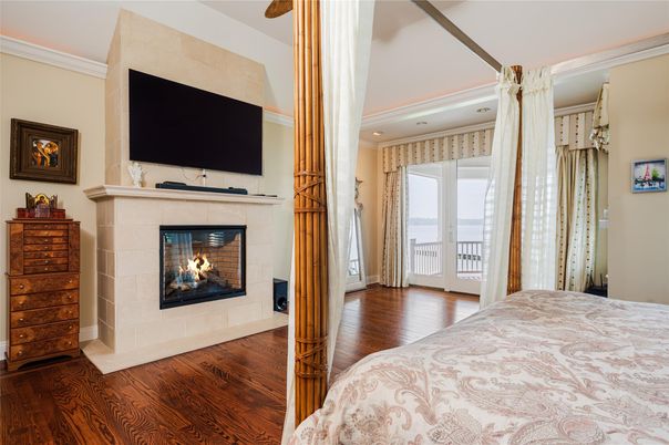 Bedroom, Fireplace, Interior, Recessed Lighting, Wood Texture Flooring