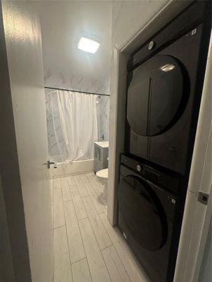 Bathroom, Interior, Utility Closets, Washer, Wood Texture Flooring