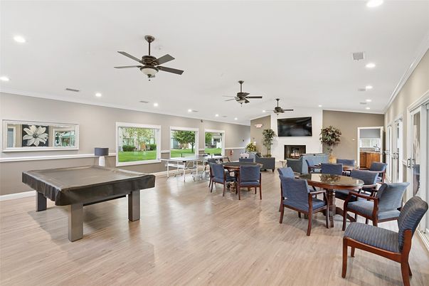 Billiard Table, Dining room, Fireplace, Game Room, Interior, Living room, Recessed Lighting, Wood Texture Flooring