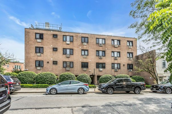 Exterior, Facade, Brick Facade, Condo Building