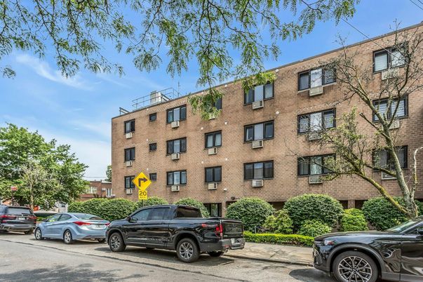 Exterior, Facade, Brick Facade, Condo Building