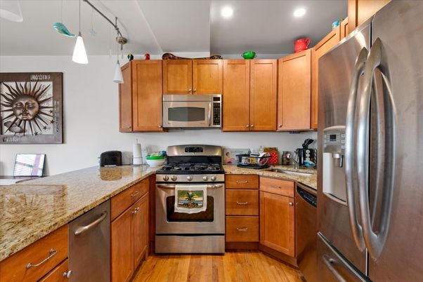 Interior, Kitchen, Pendant Lights, Recessed Lighting, Stainless Steel Appliances, Wood Texture Flooring