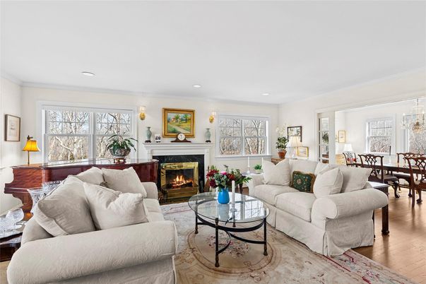 Chandelier, Dining room, Fireplace, Interior, Living room, Recessed Lighting, Wood Texture Flooring