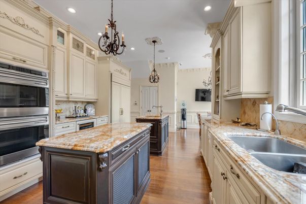 Chandelier, Interior, Kitchen, Pendant Lights, Recessed Lighting, Stainless Steel Appliances, Wood Texture Flooring