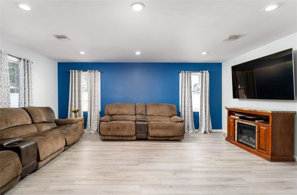 Fireplace, Interior, Living room, Recessed Lighting, Wood Texture Flooring