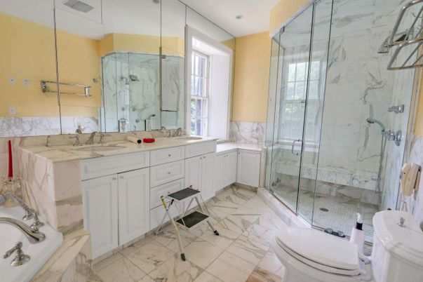 Bathroom, Dual Sink Vanities, Glass Shower, Interior, Marble, Marble Walls, Recessed Lighting