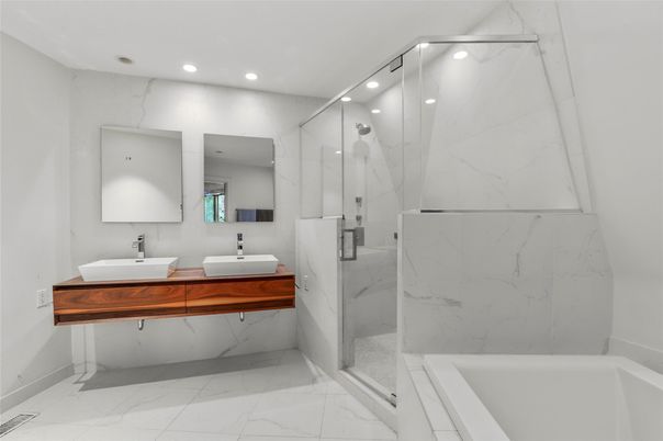 Bathroom, Dual Sink Vanities, Glass Shower, Interior, Marble, Marble Walls, Recessed Lighting