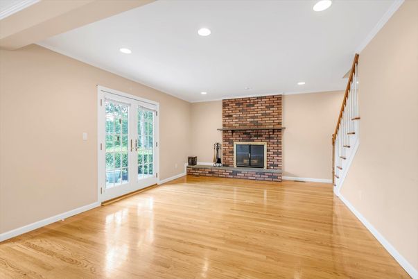 Empty room, Fireplace, Interior, Recessed Lighting, Stone Walls, Wood Texture Flooring