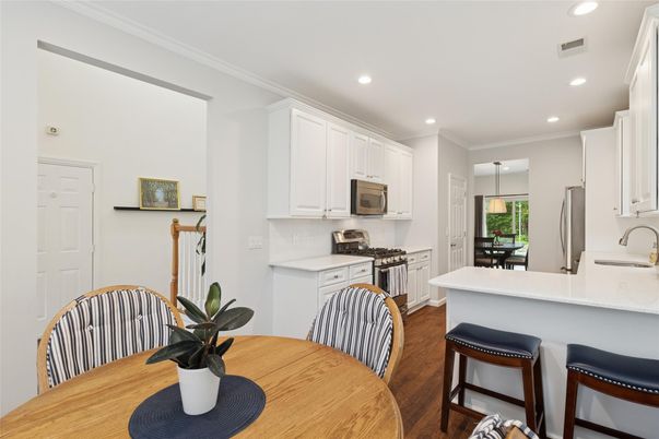 Dining room, Interior, Kitchen, Recessed Lighting, Stainless Steel Appliances, Wood Texture Flooring
