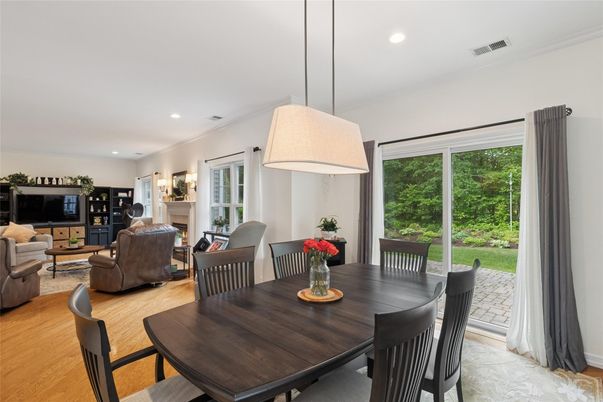 Dining room, Fireplace, Interior, Living room, Pendant Lights, Recessed Lighting, Wood Texture Flooring