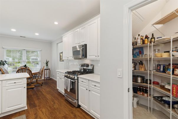 Dining room, Interior, Kitchen, Recessed Lighting, Stainless Steel Appliances, Wood Texture Flooring