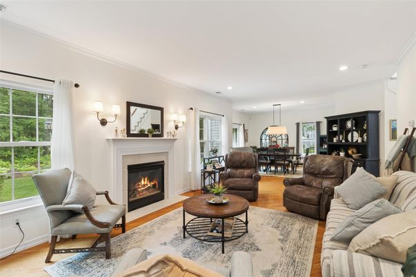 Dining room, Fireplace, Interior, Living room, Pendant Lights, Recessed Lighting, Wood Texture Flooring