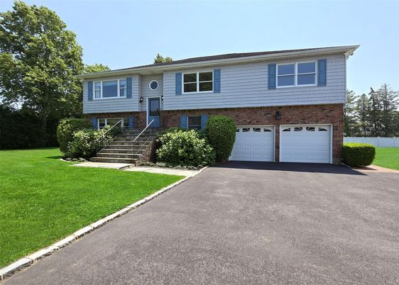 Attached, Exterior, Facade, Brick Facade, Raised Ranch